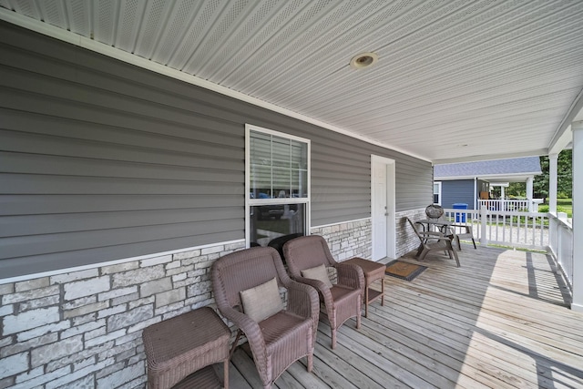 157 Joy Ave, Delaware, OH 43015 - deck featuring a porch