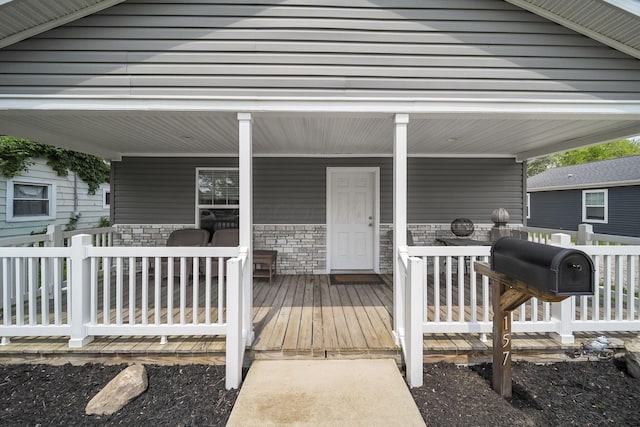 157 Joy Ave, Delaware, OH 43015 - doorway to property with a porch and stone siding