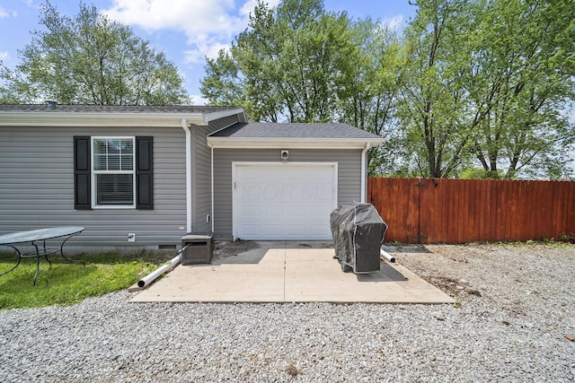 157 Joy Ave, Delaware, OH 43015 - view of front of home featuring driveway, fence, an attached garage, crawl space, and a shingled roof