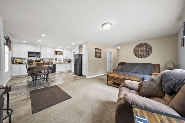 157 Joy Ave, Delaware, OH 43015 - living area with recessed lighting, baseboards, and light wood-type flooring