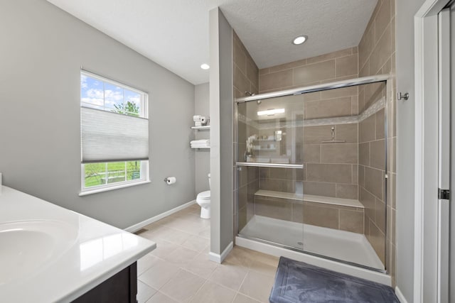 1070 Little Bear Pl, Lewis Center, OH 43035 - full bath with tile patterned floors, a shower stall, toilet, vanity, and recessed lighting