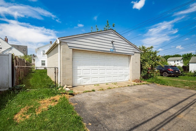 detached garage with fence