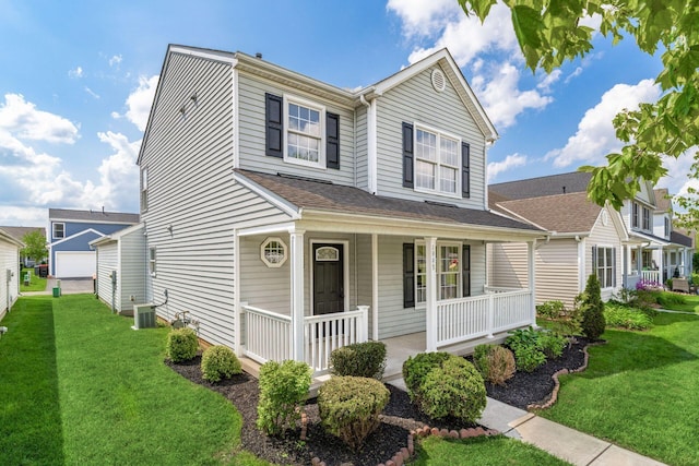 1993 Cumberland St, Newark, OH 43055 - traditional home featuring a porch, a front yard, and cooling unit