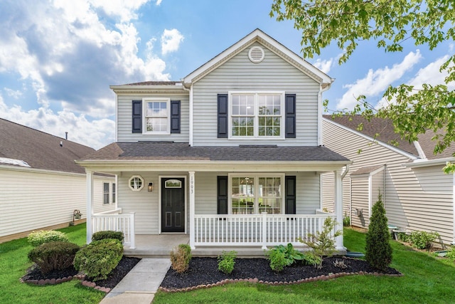 1993 Cumberland St, Newark, OH 43055 - traditional-style home with covered porch, a front yard, and a shingled roof