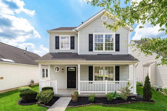 1993 Cumberland St, Newark, OH 43055 - traditional-style home with covered porch, a shingled roof, and a front lawn