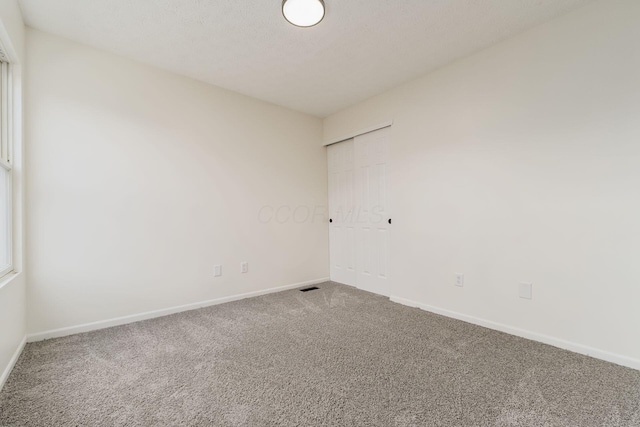 1993 Cumberland St, Newark, OH 43055 - carpeted spare room with baseboards