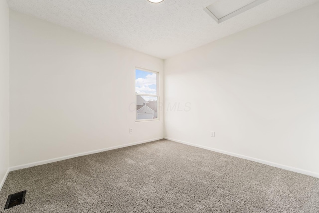 1993 Cumberland St, Newark, OH 43055 - unfurnished room with carpet flooring, baseboards, and a textured ceiling