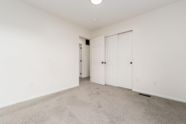 1993 Cumberland St, Newark, OH 43055 - unfurnished bedroom with carpet, baseboards, and a closet