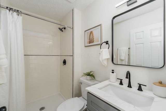 1993 Cumberland St, Newark, OH 43055 - bathroom featuring a shower stall, toilet, a textured ceiling, and vanity
