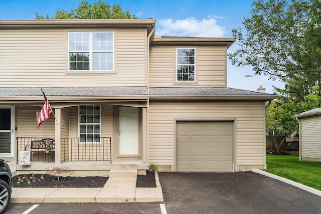 1810 Messner Dr Unit 62E, Hilliard, OH 43026 - view of front of home with a porch and a garage