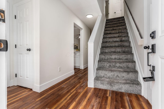 1810 Messner Dr Unit 62E, Hilliard, OH 43026 - staircase featuring wood finished floors, ceiling fan, and baseboards