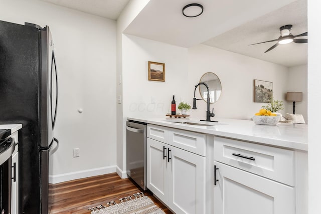 1810 Messner Dr Unit 62E, Hilliard, OH 43026 - kitchen with dishwasher, a sink, dark wood-type flooring, white cabinetry, and ceiling fan