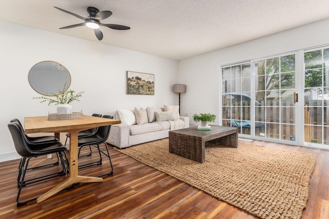 1810 Messner Dr Unit 62E, Hilliard, OH 43026 - living room with wood finished floors, a ceiling fan, and a textured ceiling