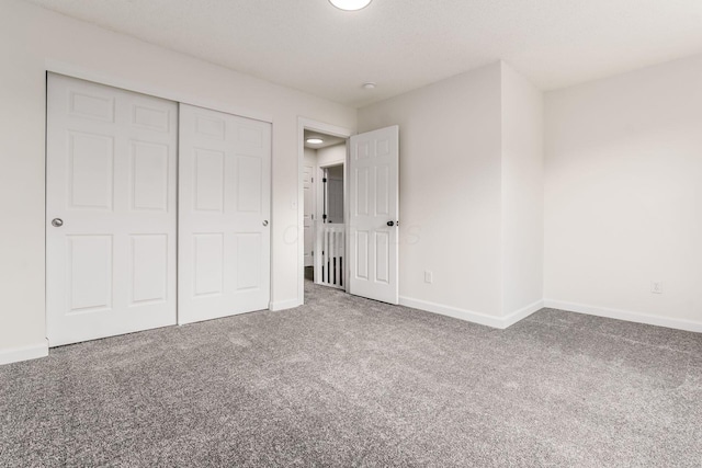 1810 Messner Dr Unit 62E, Hilliard, OH 43026 - unfurnished bedroom with carpet floors, baseboards, and a closet