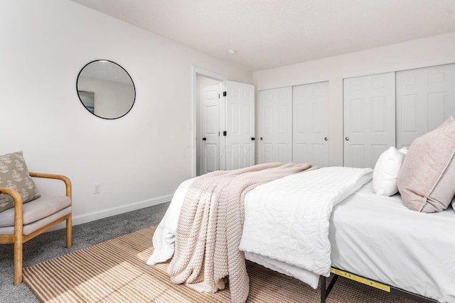 1810 Messner Dr Unit 62E, Hilliard, OH 43026 - carpeted bedroom featuring two closets and baseboards