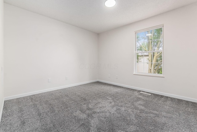 1810 Messner Dr Unit 62E, Hilliard, OH 43026 - carpeted empty room featuring baseboards