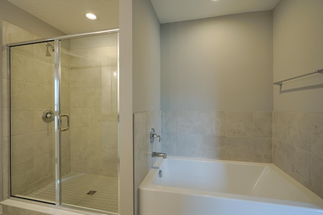 596 Courtright Dr E, Pickerington, OH 43147 - full bath featuring recessed lighting, a bath, and a shower stall