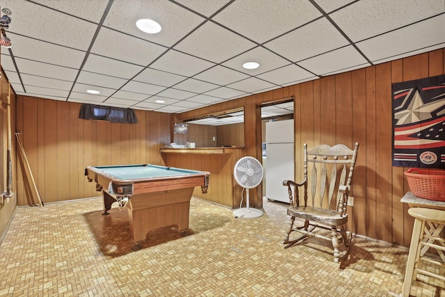 game room featuring wood walls, a drop ceiling, billiards, bar, and recessed lighting