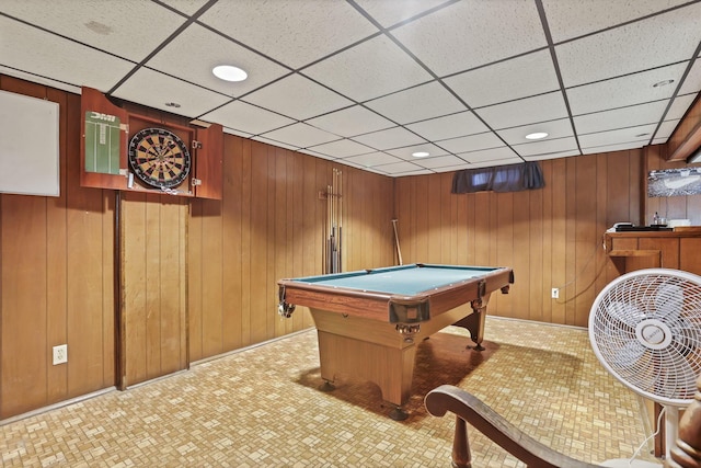 game room with billiards table, a paneled ceiling, recessed lighting, wooden walls, and tile patterned floors