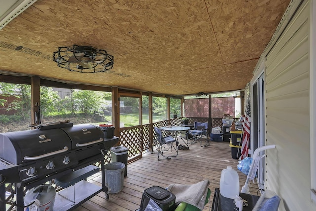 sunroom / solarium with outdoor dining area