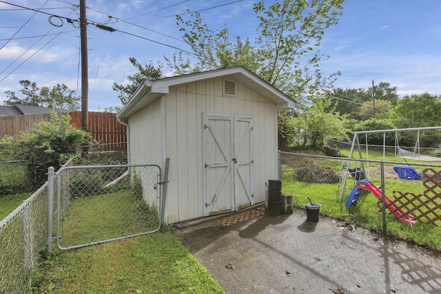 view of shed with a gate