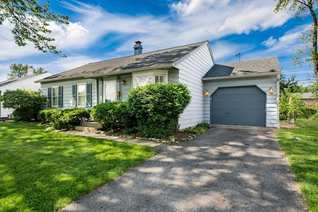 1512 Shanley Dr, Columbus, OH 43224 - ranch-style house with an attached garage, driveway, a front yard, a shingled roof, and a chimney