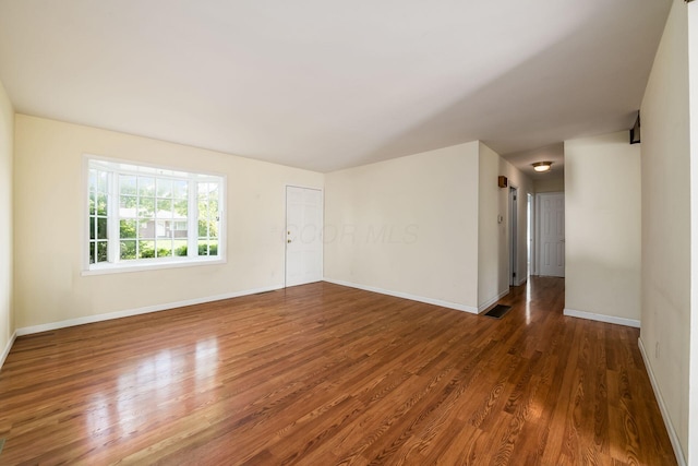 1512 Shanley Dr, Columbus, OH 43224 - empty room featuring wood finished floors and baseboards