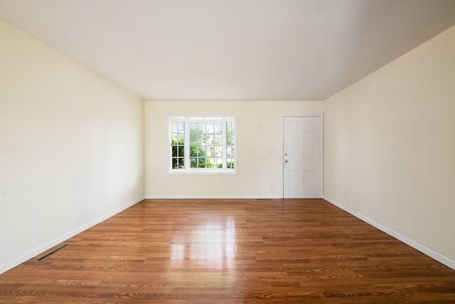 1512 Shanley Dr, Columbus, OH 43224 - empty room featuring wood finished floors and baseboards