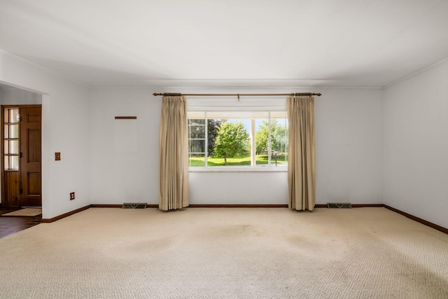 738 Stinson Dr, Columbus, OH 43214 - carpeted spare room with ornamental molding and baseboards