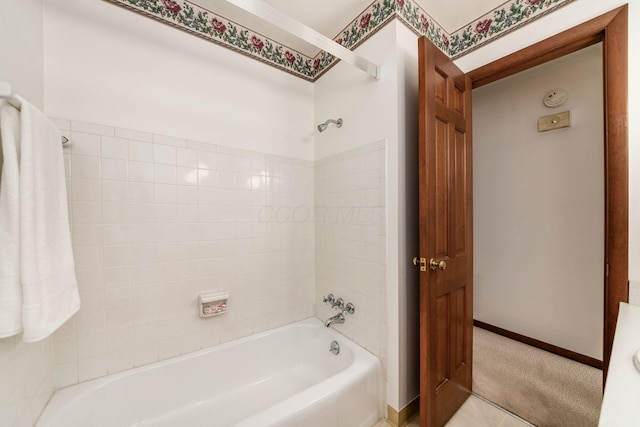 738 Stinson Dr, Columbus, OH 43214 - bathroom featuring  shower combination and baseboards