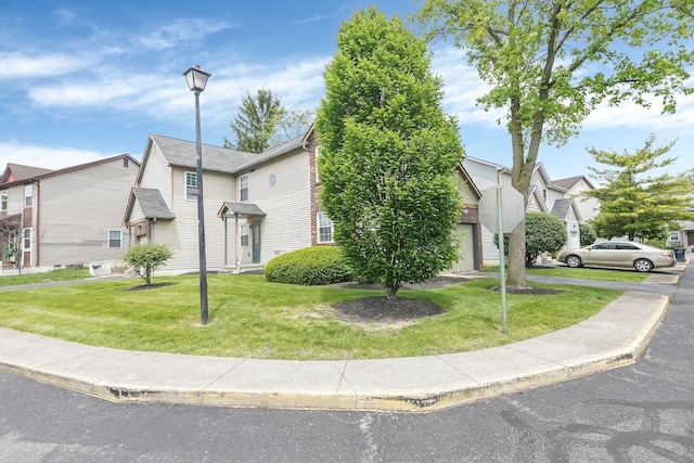 view of home's exterior with a yard
