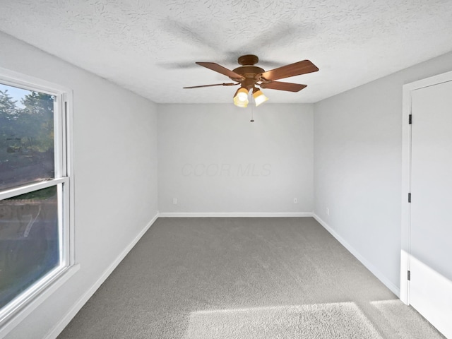 2620 Trailwind St, Grove City, OH 43123 - unfurnished room with ceiling fan, carpet floors, baseboards, and a textured ceiling