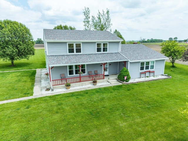 13216 Sheley Road Nw, Jeffersonville, OH 43128 - traditional-style house featuring covered porch, a front lawn, and roof with shingles