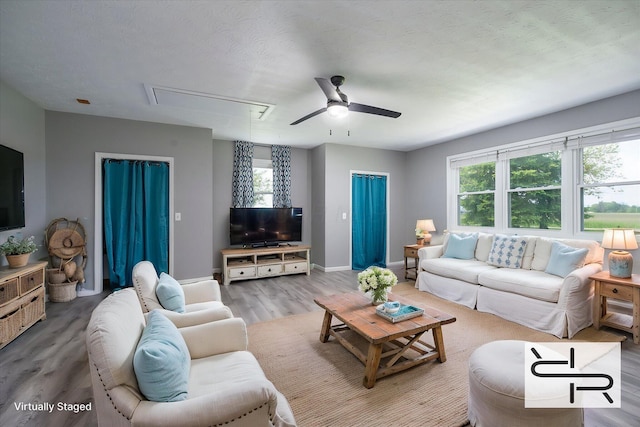 13216 Sheley Road Nw, Jeffersonville, OH 43128 - living room featuring attic access, a ceiling fan, wood finished floors, and baseboards