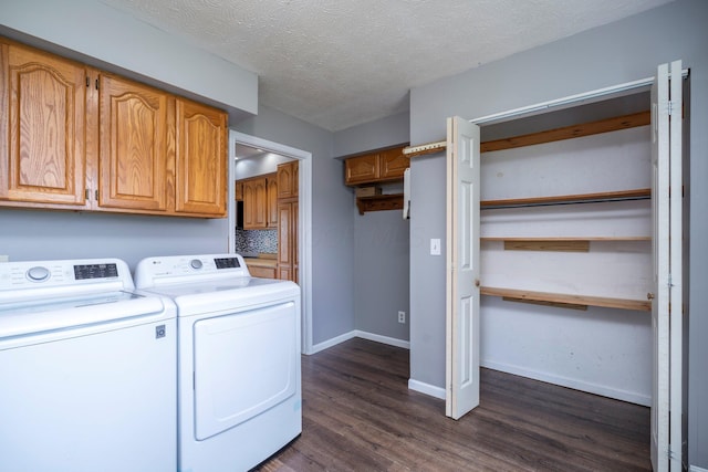 13216 Sheley Road Nw, Jeffersonville, OH 43128 - laundry room featuring washer and clothes dryer, cabinet space, dark wood finished floors, baseboards, and a textured ceiling
