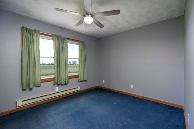 13216 Sheley Road Nw, Jeffersonville, OH 43128 - spare room with baseboard heating, carpet floors, baseboards, and a ceiling fan