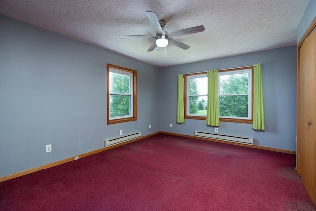 13216 Sheley Road Nw, Jeffersonville, OH 43128 - empty room with baseboard heating, healthy amount of natural light, ceiling fan, and a textured ceiling