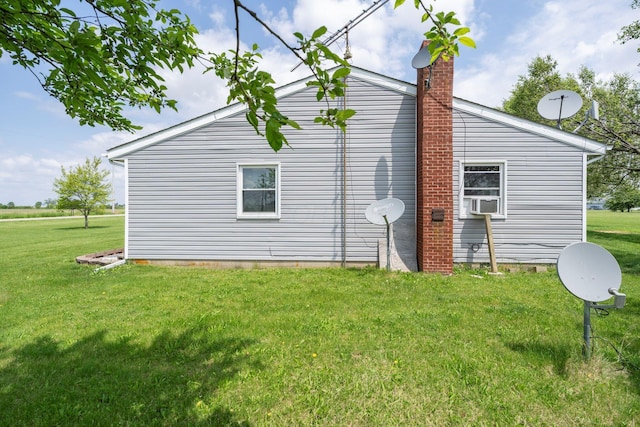 13216 Sheley Road Nw, Jeffersonville, OH 43128 - view of side of home with a yard and a chimney