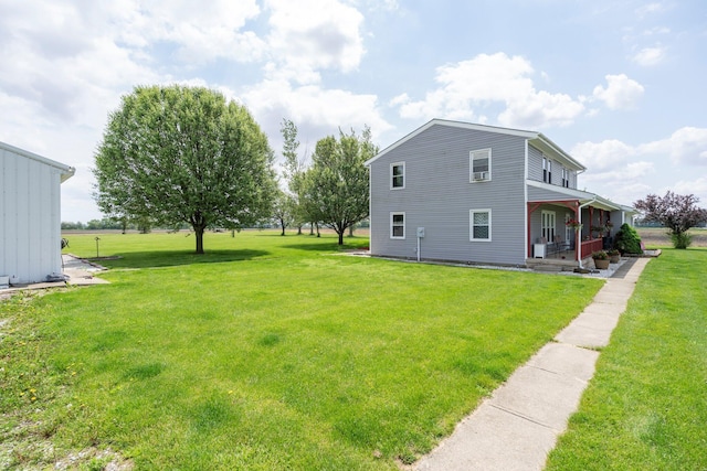 13216 Sheley Road Nw, Jeffersonville, OH 43128 - view of side of home featuring covered porch and a lawn