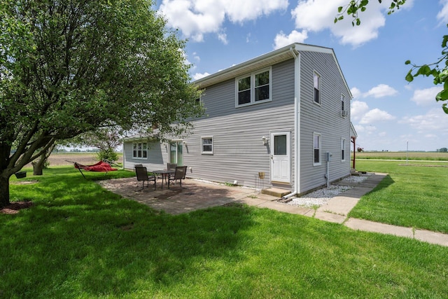 13216 Sheley Road Nw, Jeffersonville, OH 43128 - back of property featuring a yard and a patio area