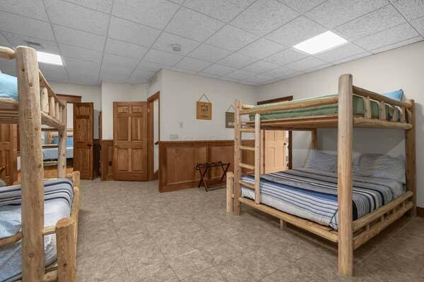 29002 Rockstull Rd, Sugar Grove, OH 43155 - bedroom with a wainscoted wall and a paneled ceiling