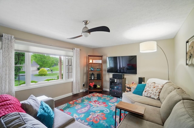 5336 Rocky Creek Dr, Grove City, OH 43123 - living area with wood finished floors, baseboards, and a ceiling fan
