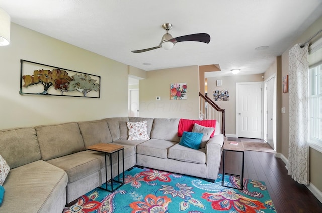 5336 Rocky Creek Dr, Grove City, OH 43123 - living area with wood-type flooring, ceiling fan, stairway, and baseboards
