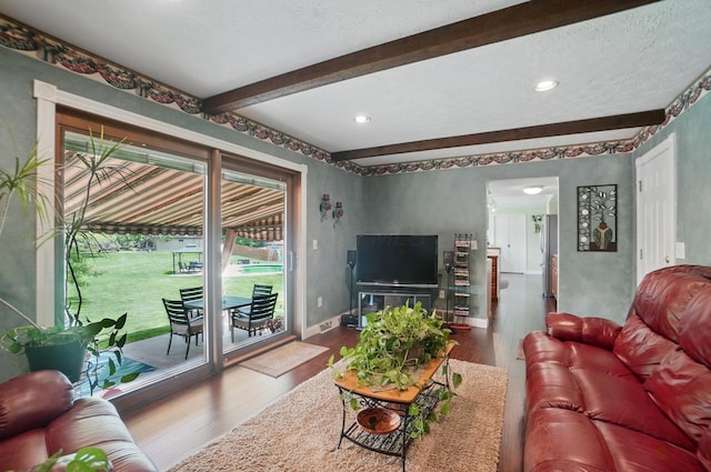 5336 Rocky Creek Dr, Grove City, OH 43123 - living area featuring wood finished floors, beamed ceiling, recessed lighting, baseboards, and a textured ceiling