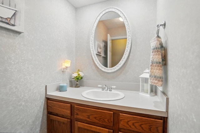5336 Rocky Creek Dr, Grove City, OH 43123 - bathroom with vanity and a textured wall