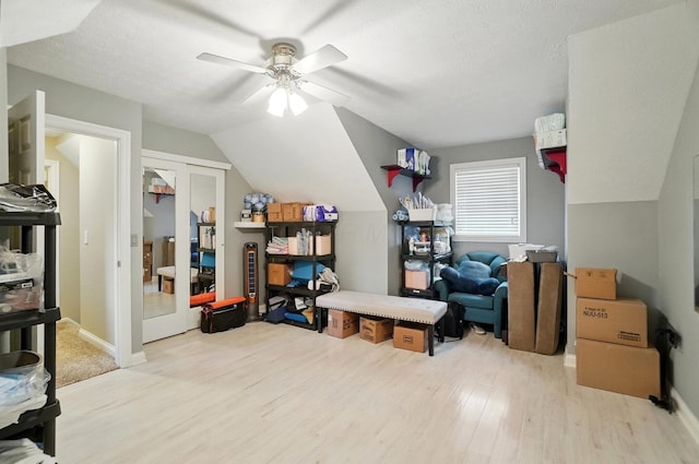 5336 Rocky Creek Dr, Grove City, OH 43123 - additional living space with light wood-style flooring, ceiling fan, lofted ceiling, baseboards, and a textured ceiling