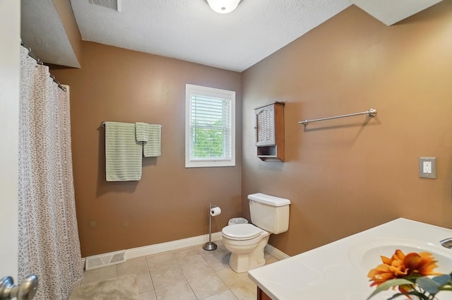 5336 Rocky Creek Dr, Grove City, OH 43123 - bathroom featuring baseboards, toilet, vanity, and tile patterned flooring
