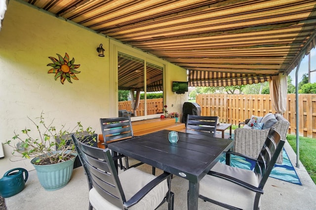 5336 Rocky Creek Dr, Grove City, OH 43123 - view of patio / terrace with fence and outdoor dining space