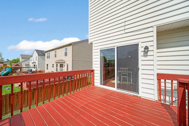 wooden terrace with a residential view
