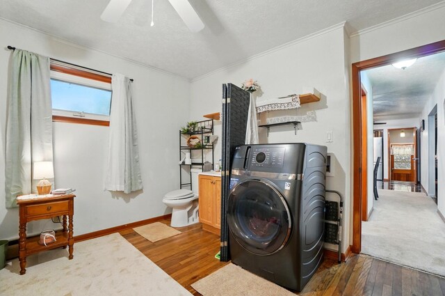700 Taylor Blair Rd, West Jefferson, OH 43162 - laundry area featuring washer / dryer, hardwood / wood-style flooring, crown molding, ceiling fan, and baseboards